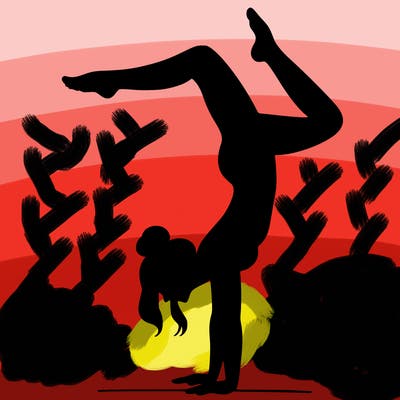 a woman doing a handstand