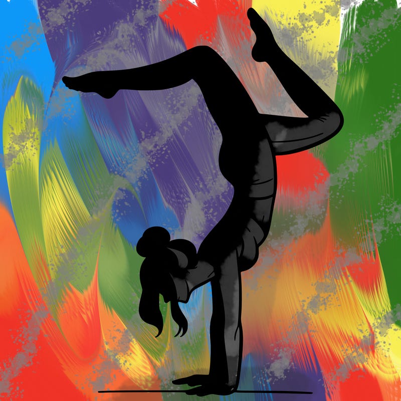 a woman doing a handstand