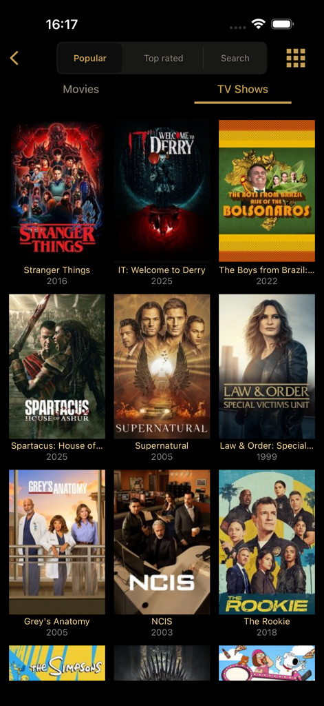Watched TV: Movies & TV Shows - Una cuadrícula de series de televisión populares en la interfaz de la aplicación Watched TV, incluyendo Stranger Things y NCIS