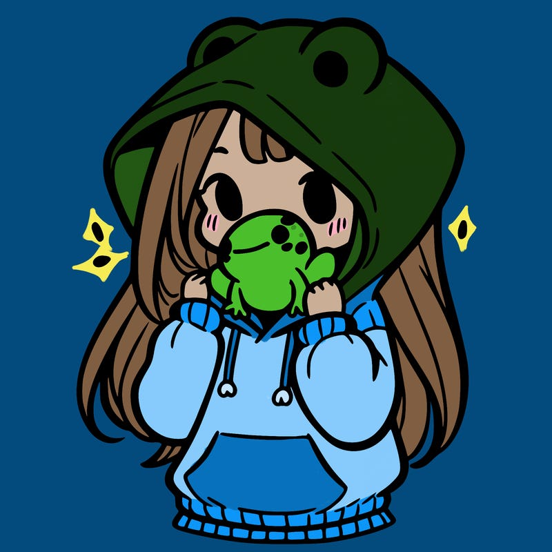 a girl holding a froggy hoodie