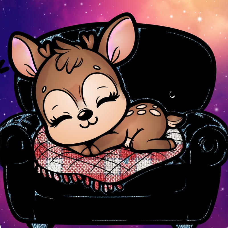 a cute baby deer on a couch sleeping