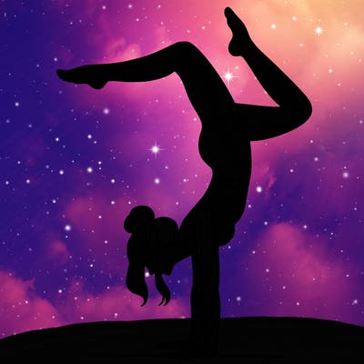 a woman doing a handstand