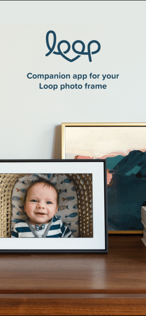 Loop Photo Frame - A digital photo frame displaying a smiling baby photo next to a companion app text and logo.