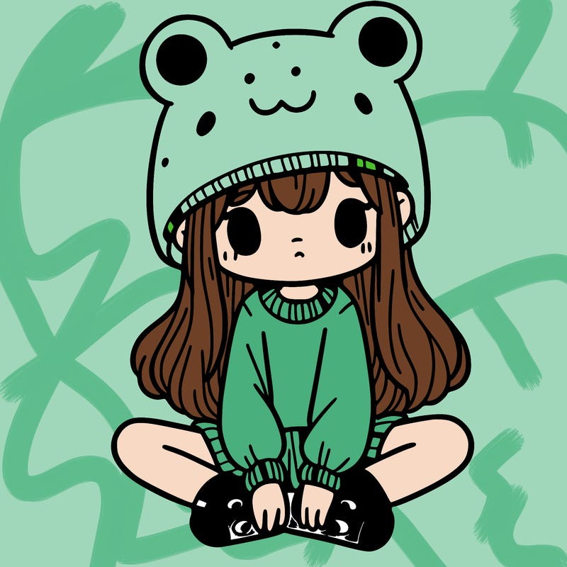 a girl wearing a frog hat and some frog socks