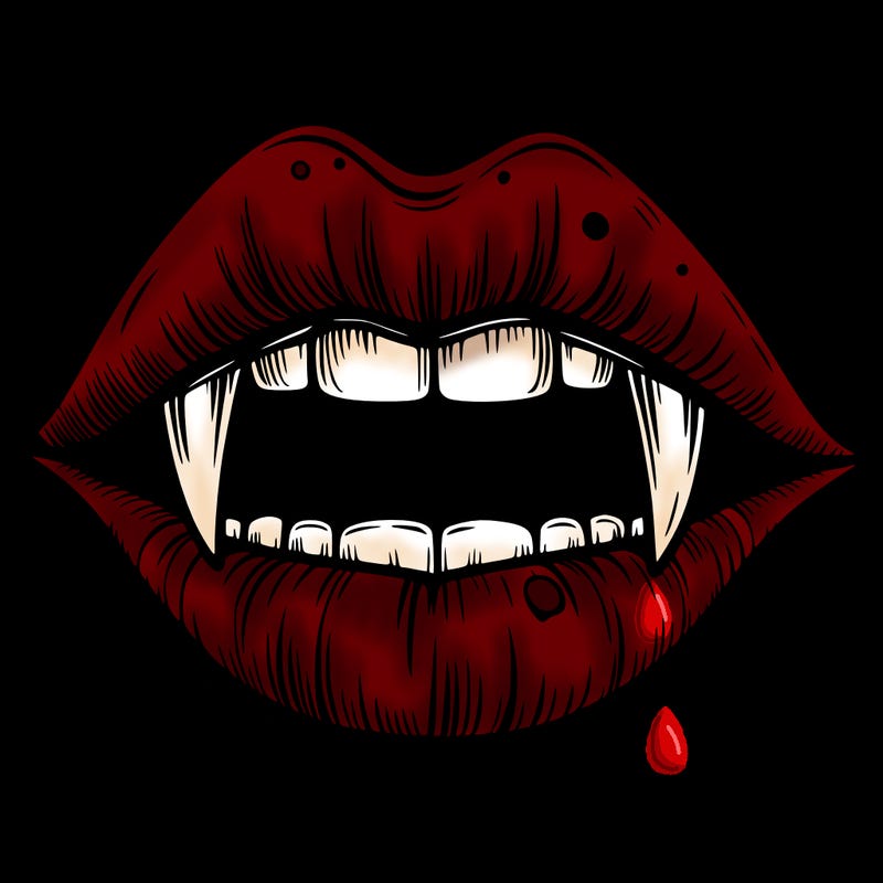 lips with vampire teeth
