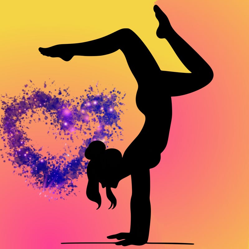 a woman doing a handstand