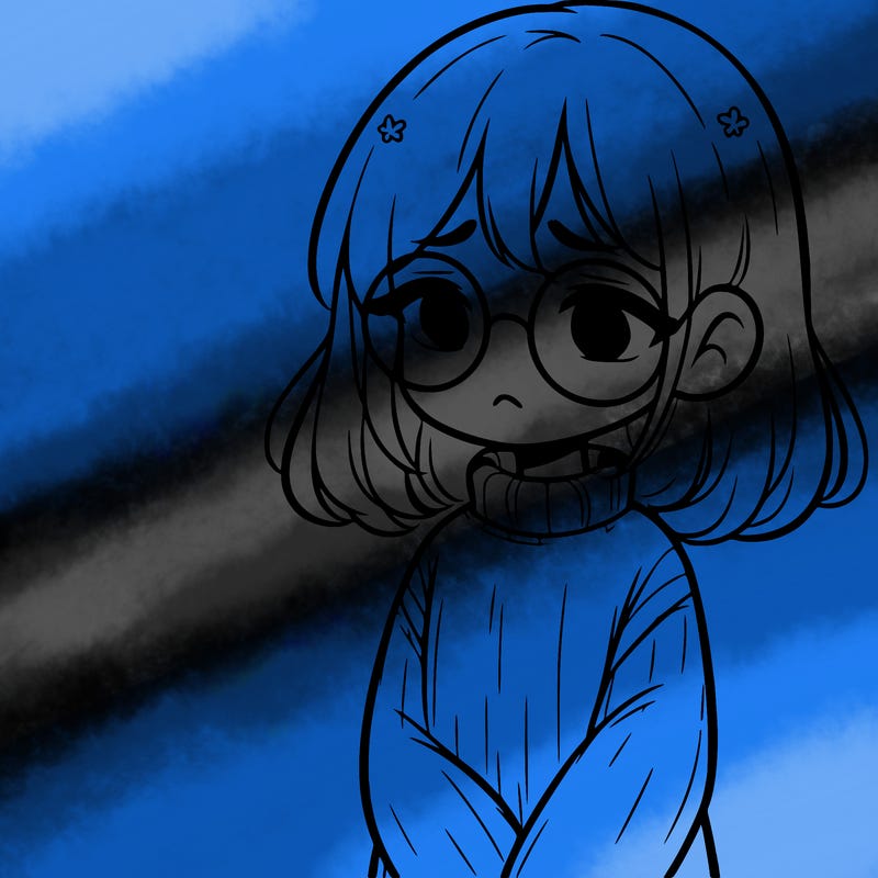 sad girl with glasses in a sweater