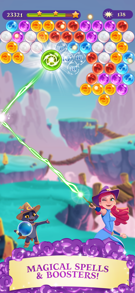 Bubble Witch 3 Saga - Stella the Witch using a magical aiming line to pop bubbles in Bubble Witch 3 Saga