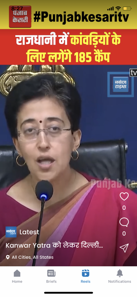 Navodaya Times - Navodaya Times app interface showing a Hindi news reel with a video report and navigation menu