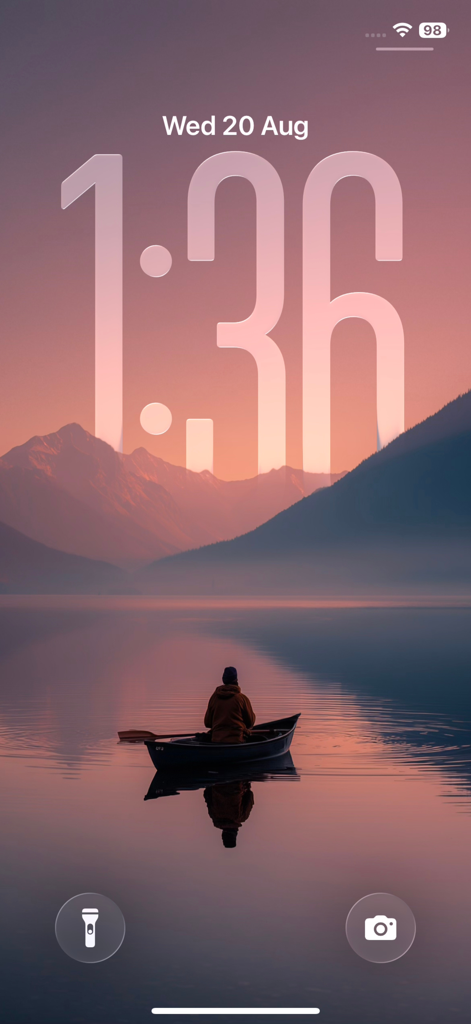 Wallbyte: 4k Wallpapers - iPhone lock screen featuring a serene 4K scenery wallpaper of a person in a boat on a calm lake