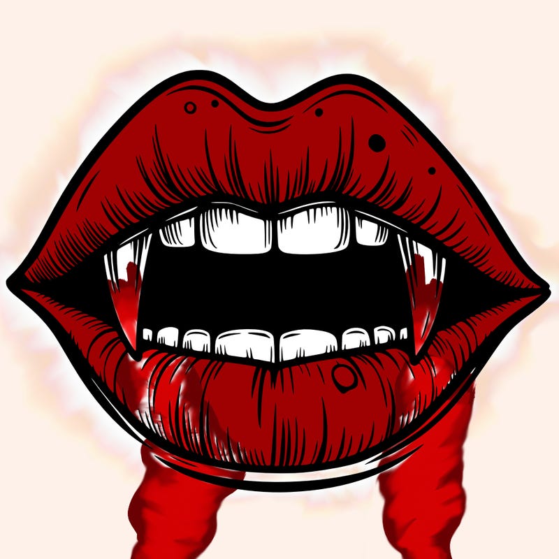 lips with vampire teeth