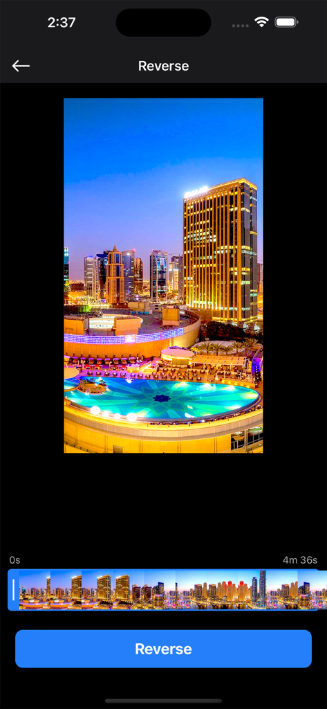 Video Compressor: Resize Video - User interface of the Video Compressor app showing the reverse video editing tool with city skyline footage