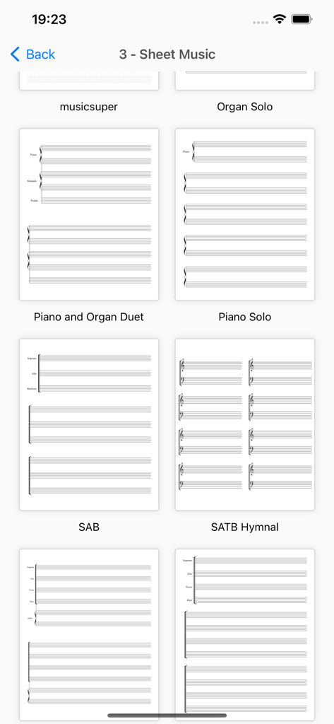 Sheet Music - Composer,Scanner - Una pantalla que muestra varias plantillas de partituras en blanco para diferentes instrumentos y arreglos vocales