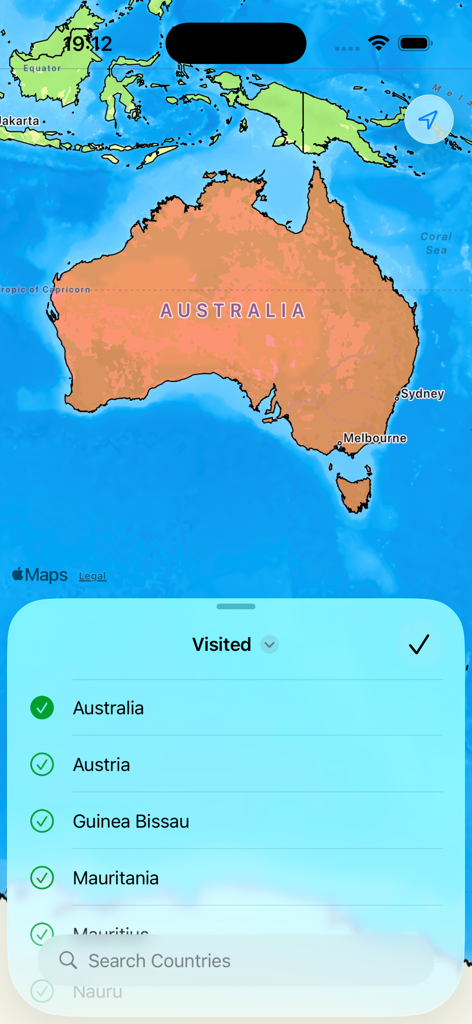 Un mapa interactivo del mundo que resalta Australia con una superposición de lista de verificación de países visitados en la aplicación de seguimiento de viajes.