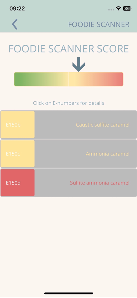 Foodie Scanner - Pantalla de la aplicación Foodie Scanner que muestra calificaciones de seguridad codificadas por colores para aditivos alimentarios identificados como E150b y E150d