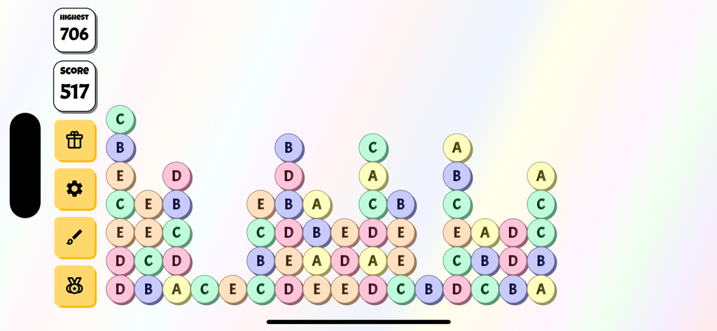 ABCDE Game - A colorful mobile puzzle game interface featuring lettered circles like A, B, C, D, and E with a score tracker.