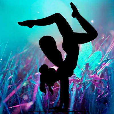 a woman doing a handstand