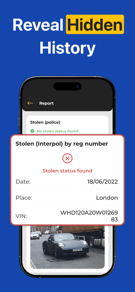 Smartphone displaying a vehicle history report with a stolen status alert found by Interpol.