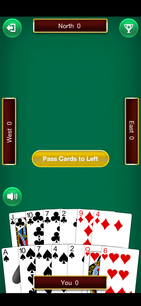 A mobile gameplay screen of the Hearts card game showing a player hand and a button to pass cards to the left on a green table