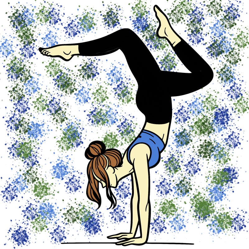 a woman doing a handstand