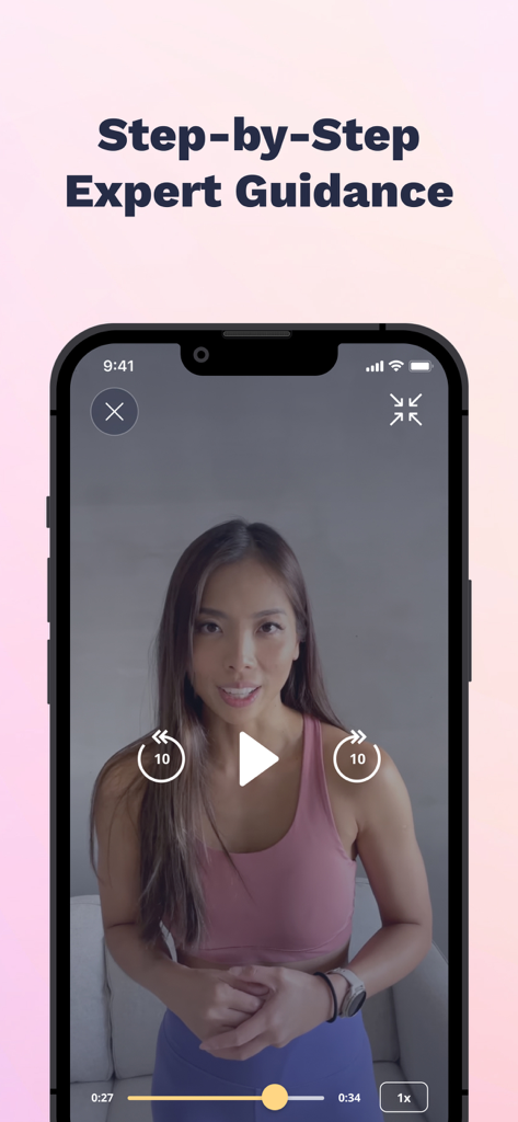 Nüli - Home & Gym Workouts - Nuli app screenshot showing a fitness video with step-by-step expert guidance from a female trainer