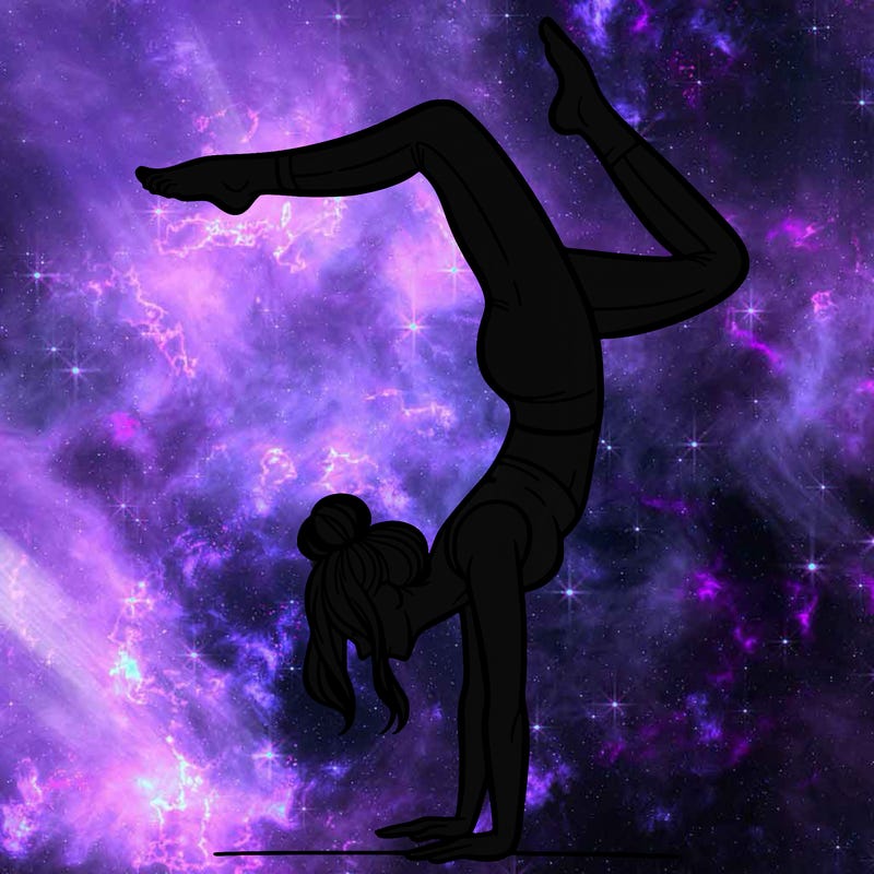 a woman doing a handstand