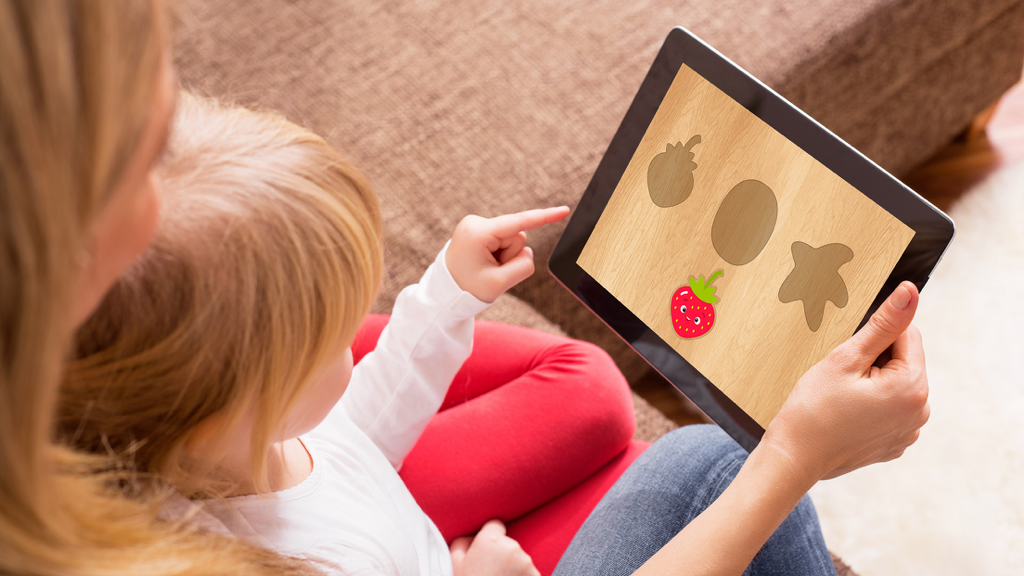 Baby games for one year olds! - A mother and toddler playing an educational shape puzzle game on an iPad