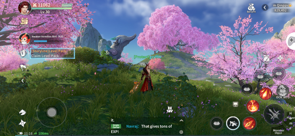 A character in Eternal Sword Pact standing in a green field surrounded by vibrant pink cherry blossom trees with the mobile game UI visible.