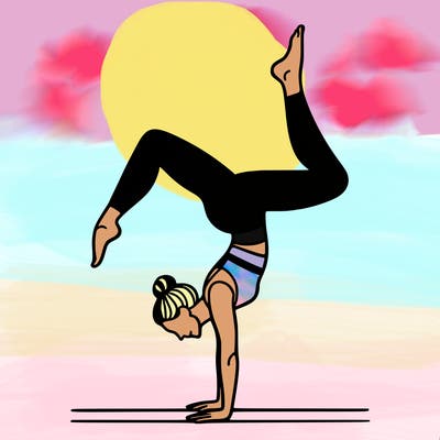 a woman doing a handstand