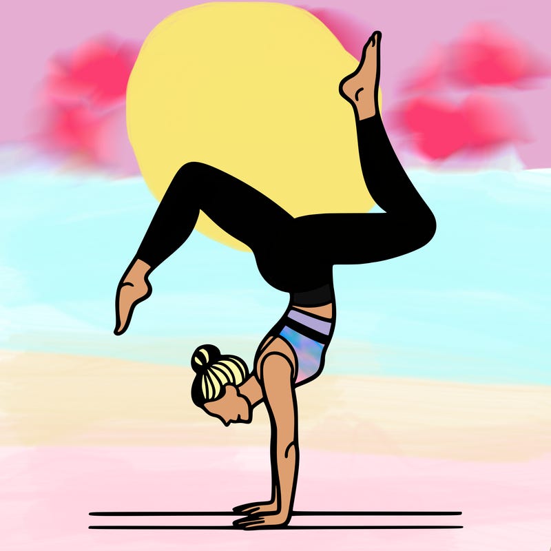 a woman doing a handstand