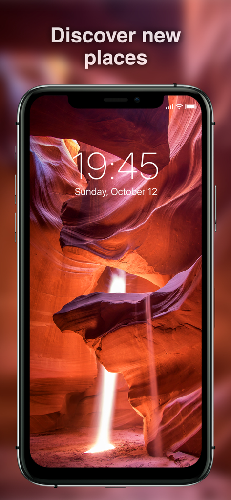 Best Wallpapers 4K - Schermata di blocco iPhone che mostra uno sfondo naturale 4K di un canyon illuminato dal sole