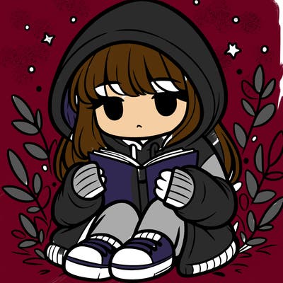 girl in oversized hoodie reading a book