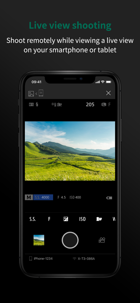 FUJIFILM Camera Remote - Smartphone screen displaying the live view shooting feature of the Fujifilm Camera Remote app with a green landscape