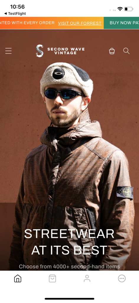 Second Wave Vintage - Second Wave Vintage app home screen showing a model in streetwear fashion