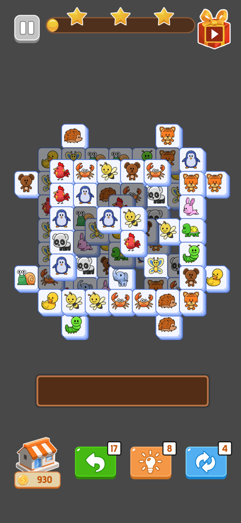 Triple Match : Tile Puzzle 3D - A gameplay screenshot of Triple Match Tile Puzzle 3D showing multiple layers of colorful animal-themed tiles on a gray background.