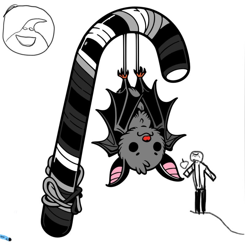 a bat hanging upside down on a candy cane