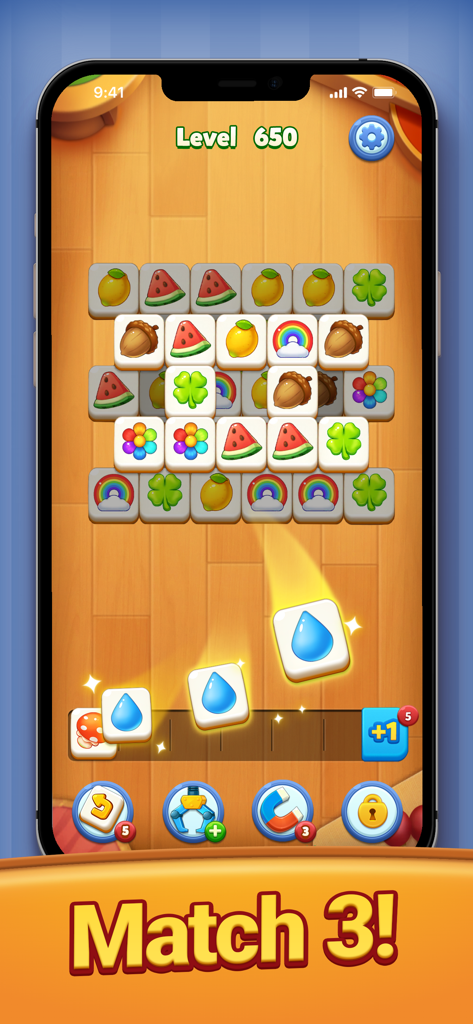 Tile Family®:Match Puzzle Game - A mobile game screen from Tile Family Match Puzzle showing level 650 with colorful fruit and rainbow tiles on a wooden background