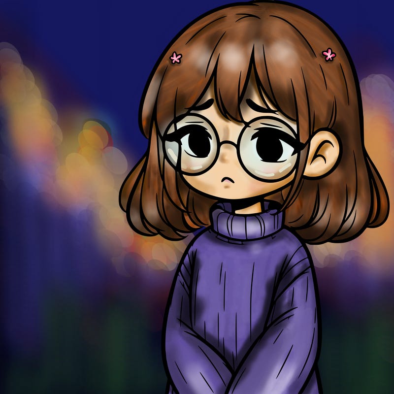 sad girl with glasses in a sweater