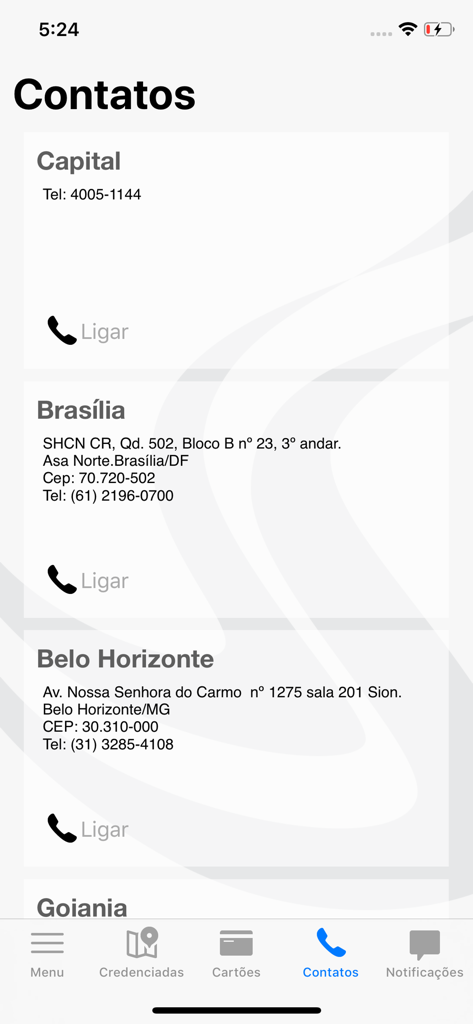 Captura de tela da página de contatos do aplicativo ValeShop Benefícios listando números de telefone e endereços de escritórios regionais para o Brasil.