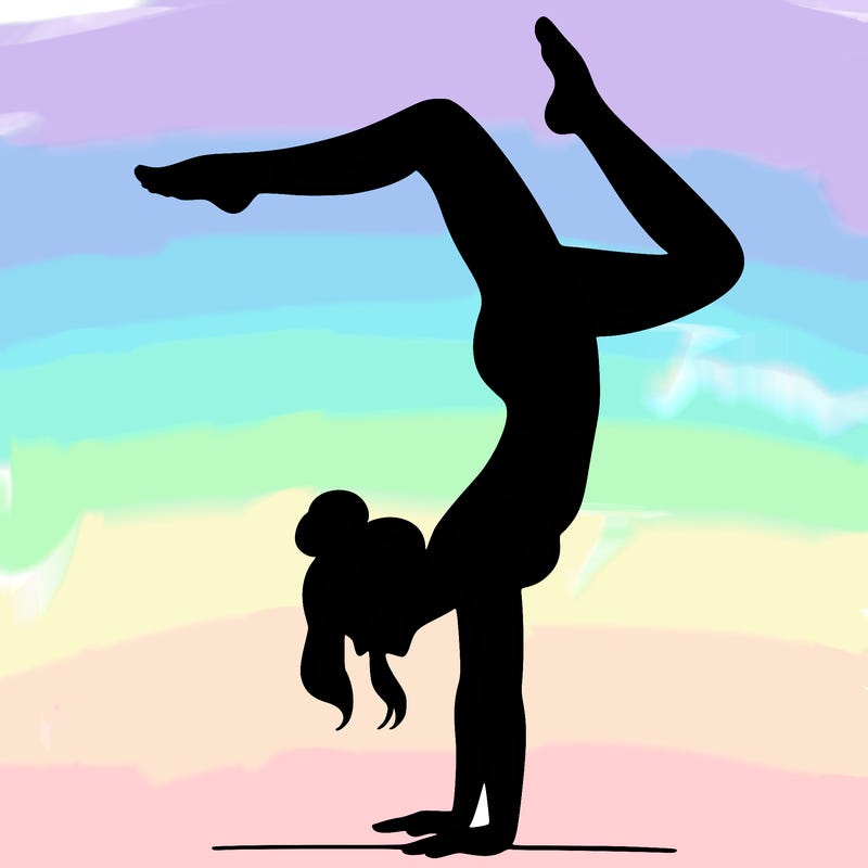 a woman doing a handstand