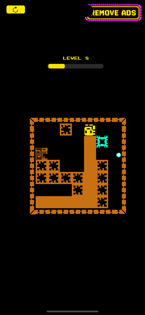 Gameplay of a yellow character painting a path through a retro arcade maze in Tomb of the Color Mask