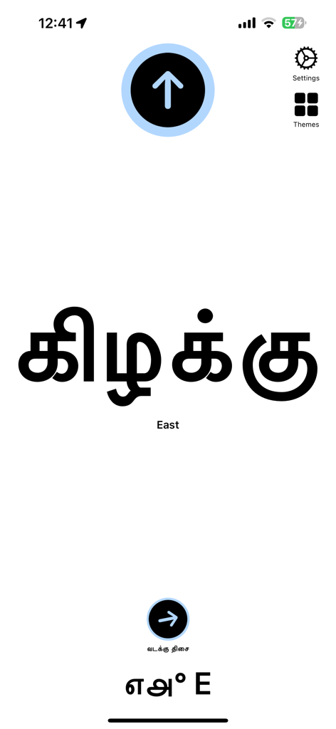 Tamil Directions Compass mobile app interface showing the direction East in Tamil script and English