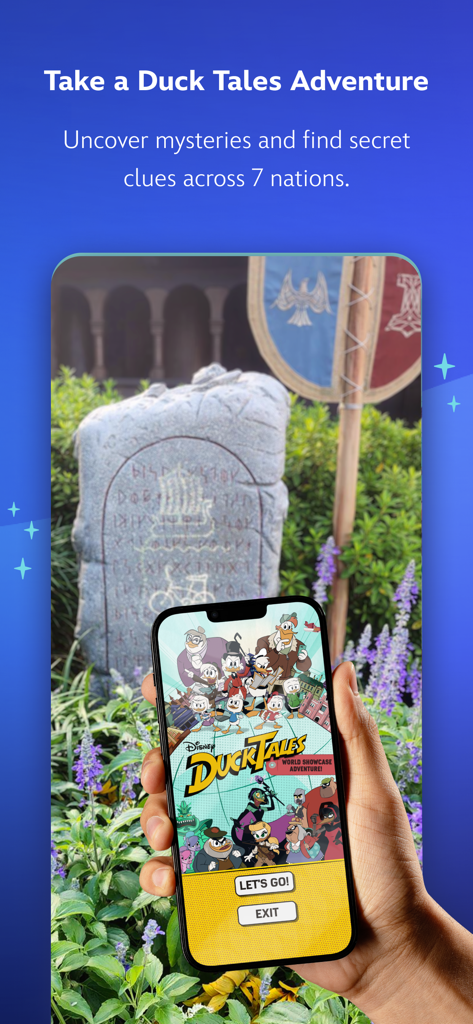 A smartphone showing the DuckTales World Showcase Adventure game within the Play Disney Parks app in front of a stone monument.