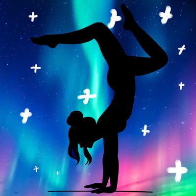 a woman doing a handstand