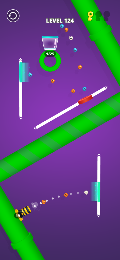 Cannon Shot! - A screenshot of Cannon Shot gameplay on level 124 featuring a cannon shooting colorful balls through teleporters into a glass bucket
