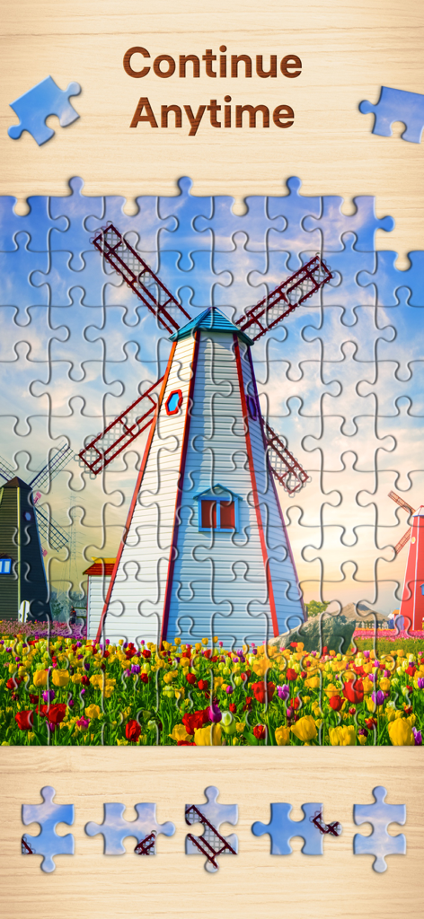 Digital jigsaw puzzle of a windmill and tulip field in the Jigsaw Puzzles app