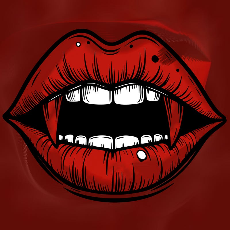 lips with vampire teeth