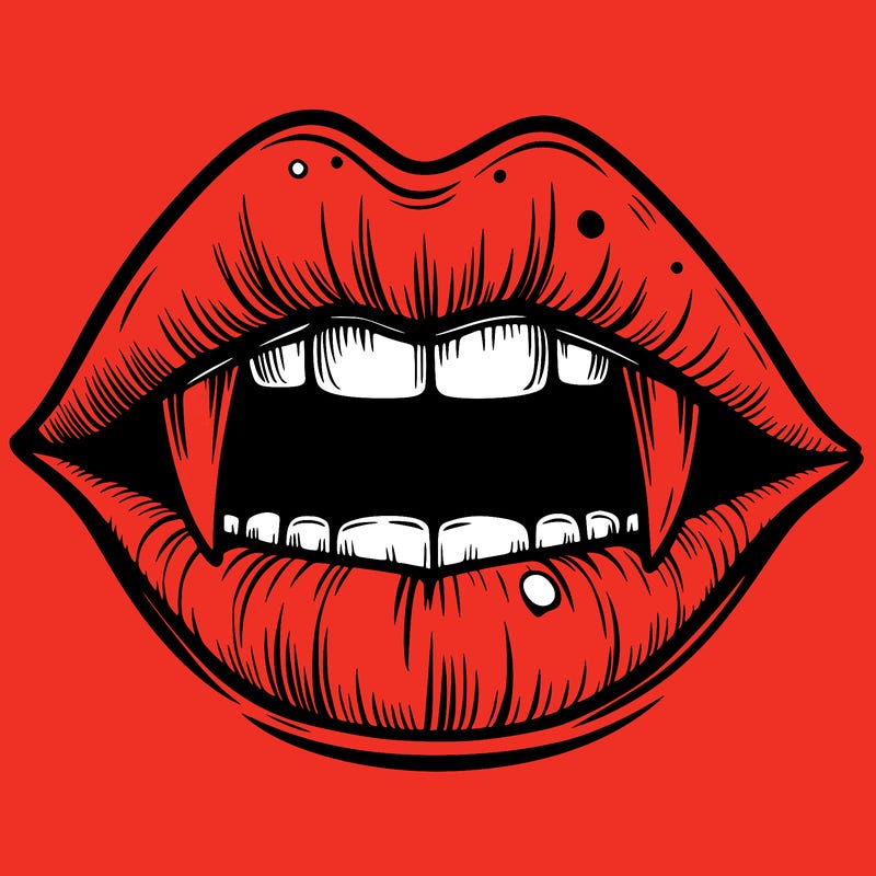 lips with vampire teeth