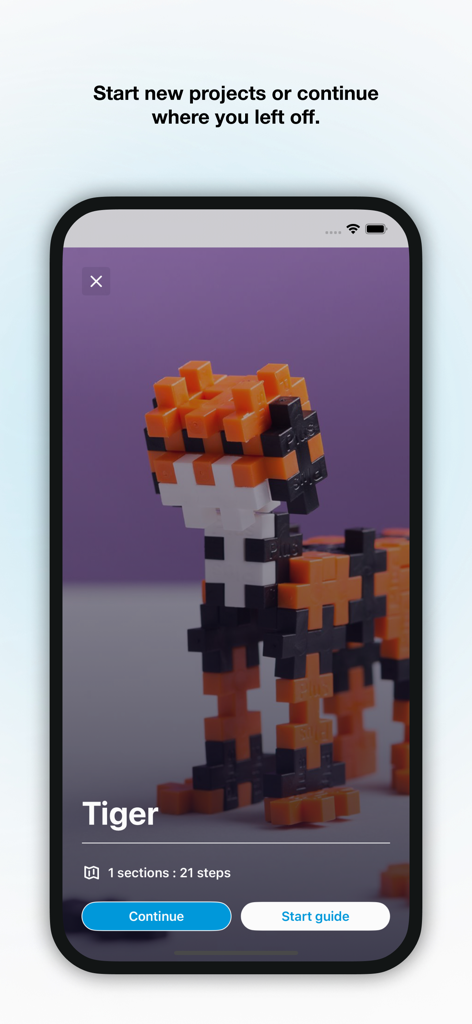 Plus-Plus - Guides & Ideas - A mobile app interface showing a building project for a tiger made with Plus-Plus bricks