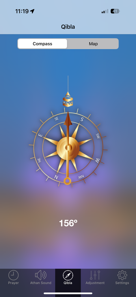 Golden Qibla compass interface showing direction to the Kaaba at 156 degrees